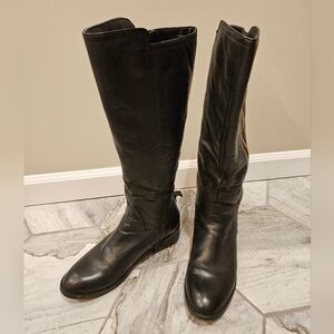 Tall black leather boots